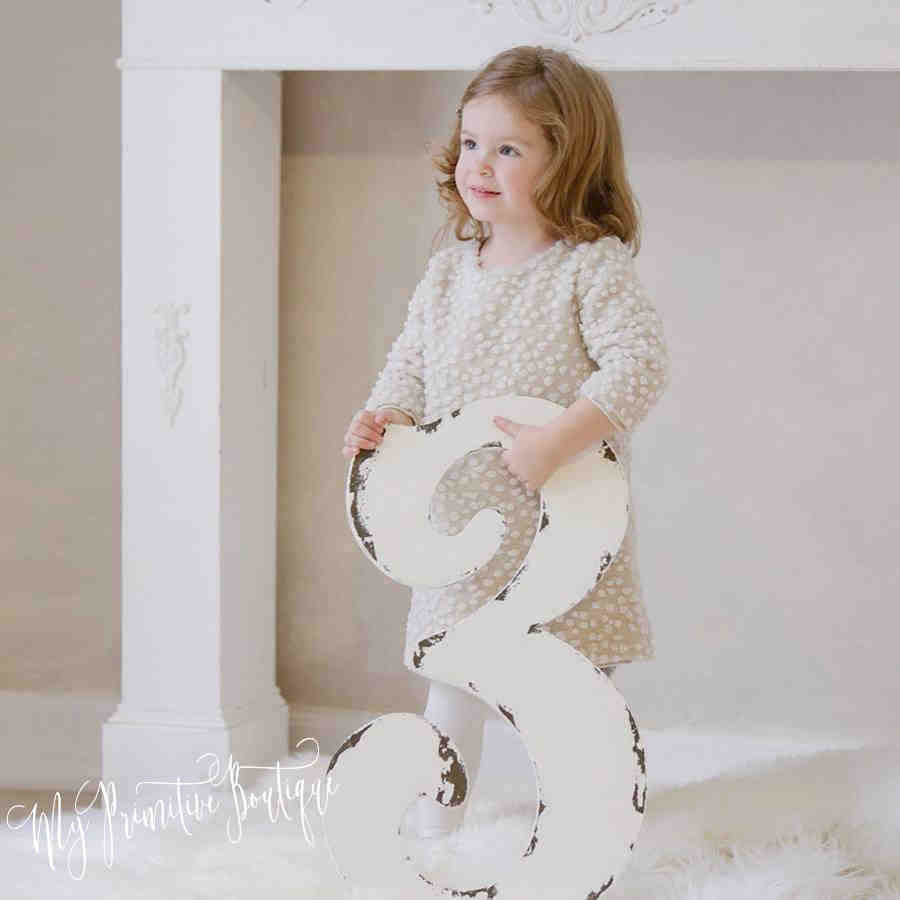 Our 2ft tall number 3 in our distressed ivory finish makes the perfect party decor