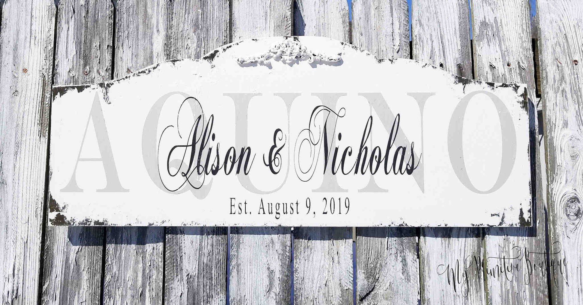 Custom established family name sign distressed ivory finish with black lettering.