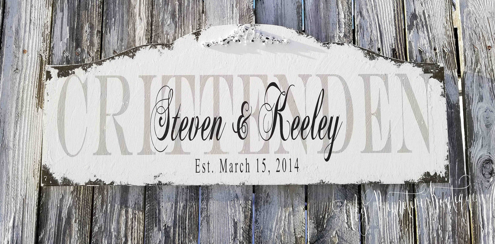 Personalized family name sign distressed ivory finish with black lettering and floral motif