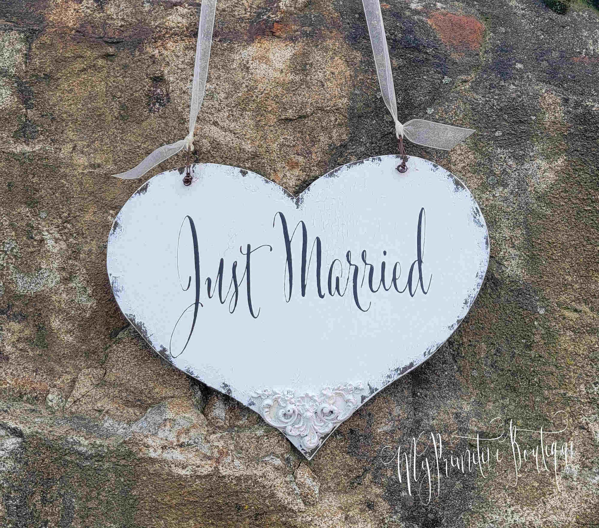 Rustic Just Married heart sign hanging with ribbon wedding décor