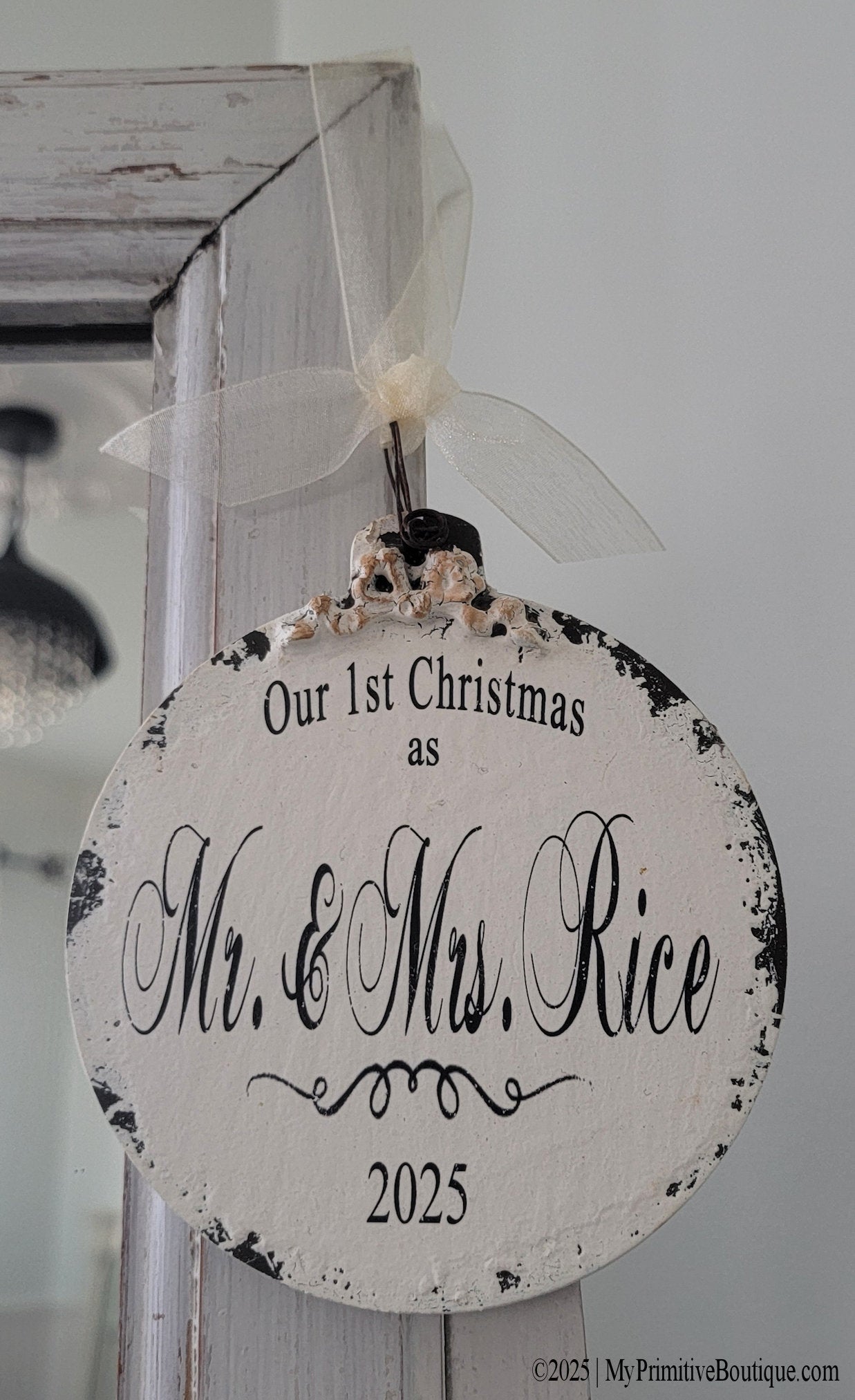 Mr. & Mrs. wood ball ornament, personalized with last name and year. Hand painted in distressed ivory finish.
