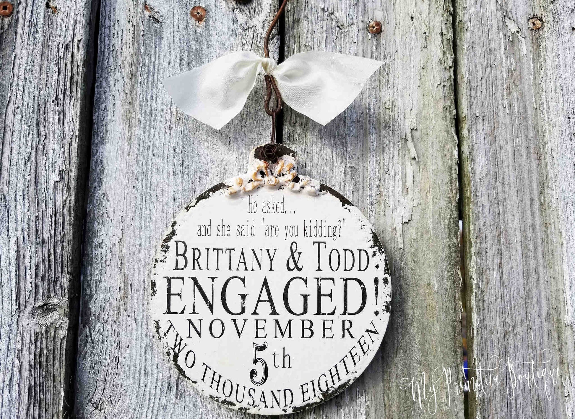 Custom wooden ball ornament with names and date rustic keepsake for engagements or anniversaries