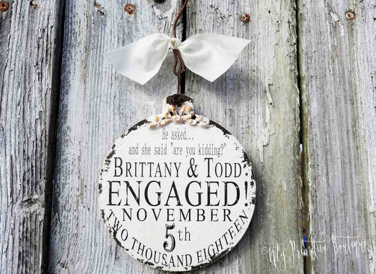 Custom wooden ball ornament with names and date rustic keepsake for engagements or anniversaries
