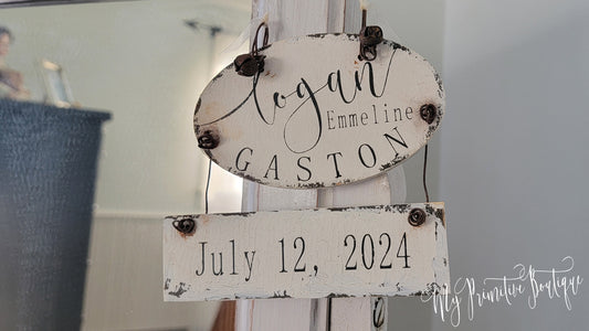 Rustic Baby’s First Christmas ornament personalized with name and year distressed ivory keepsake