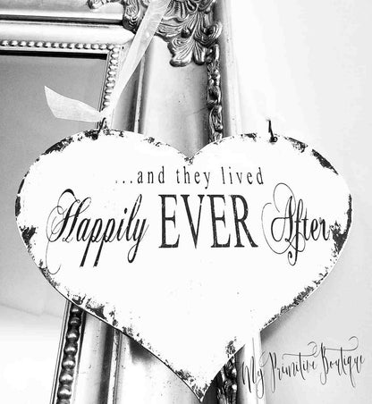 Wood heart-shaped wedding sign reading ‘Happily Ever After’ hand painted in distressed ivory farmhouse style.
