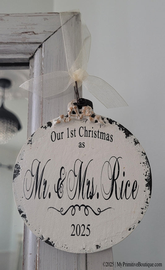 Mr. & Mrs. wood ball ornament, personalized with last name and year. Hand painted in distressed ivory finish.